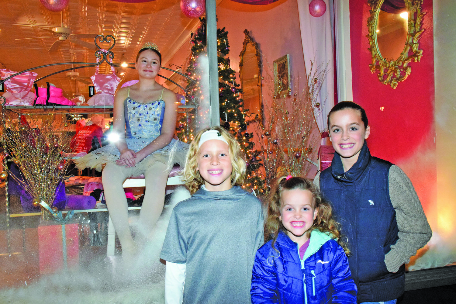 Amelia, Oliver and Rudy in front of ballerina Kayli Sassaman.