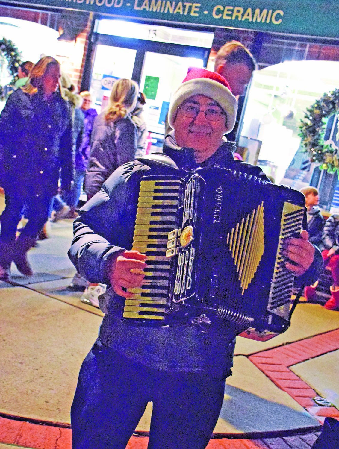 Joe Defranco plays an accordion.