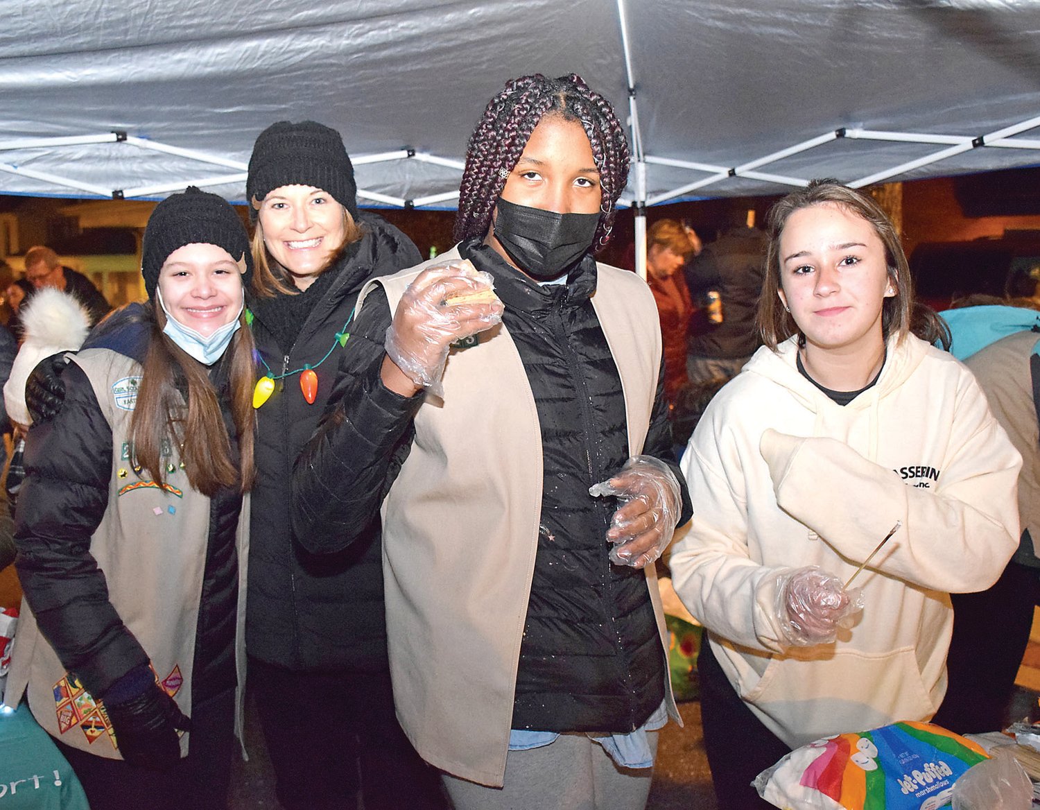 Ella Glowacki and her mother, Dawn Glowacki, and Jasmine Madison and Alyna Passerini of Girls Scout Troop 2423.