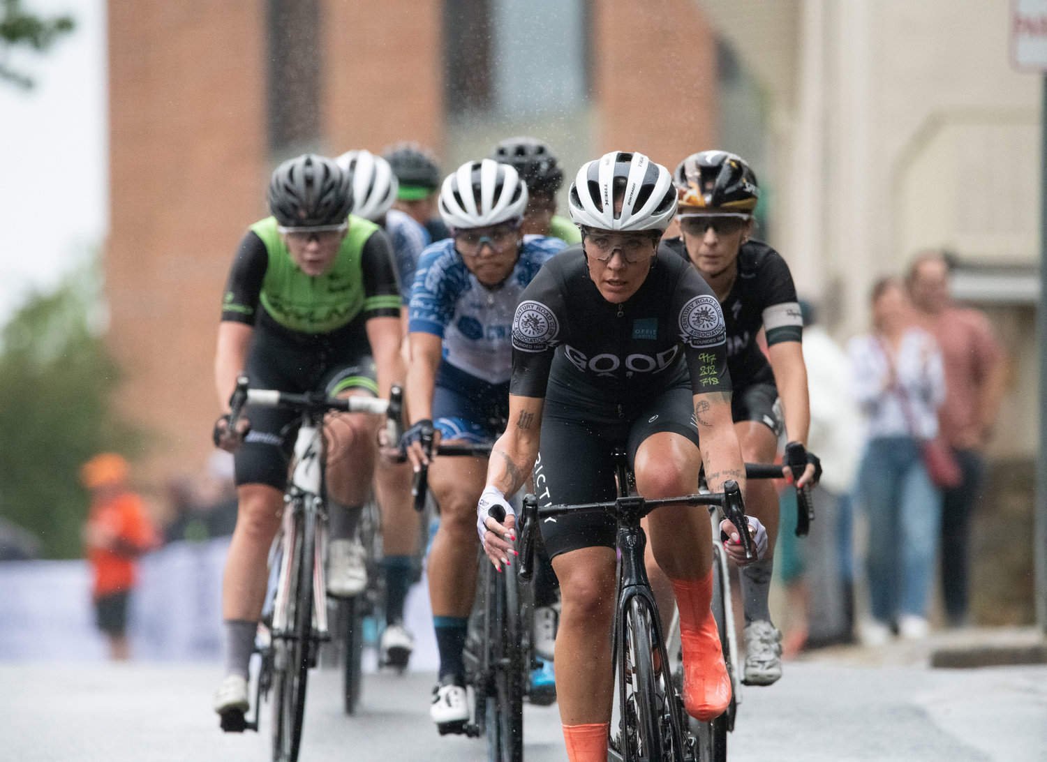 Doylestown Health Women Pro 1/2 cyclists race through Doylestown.