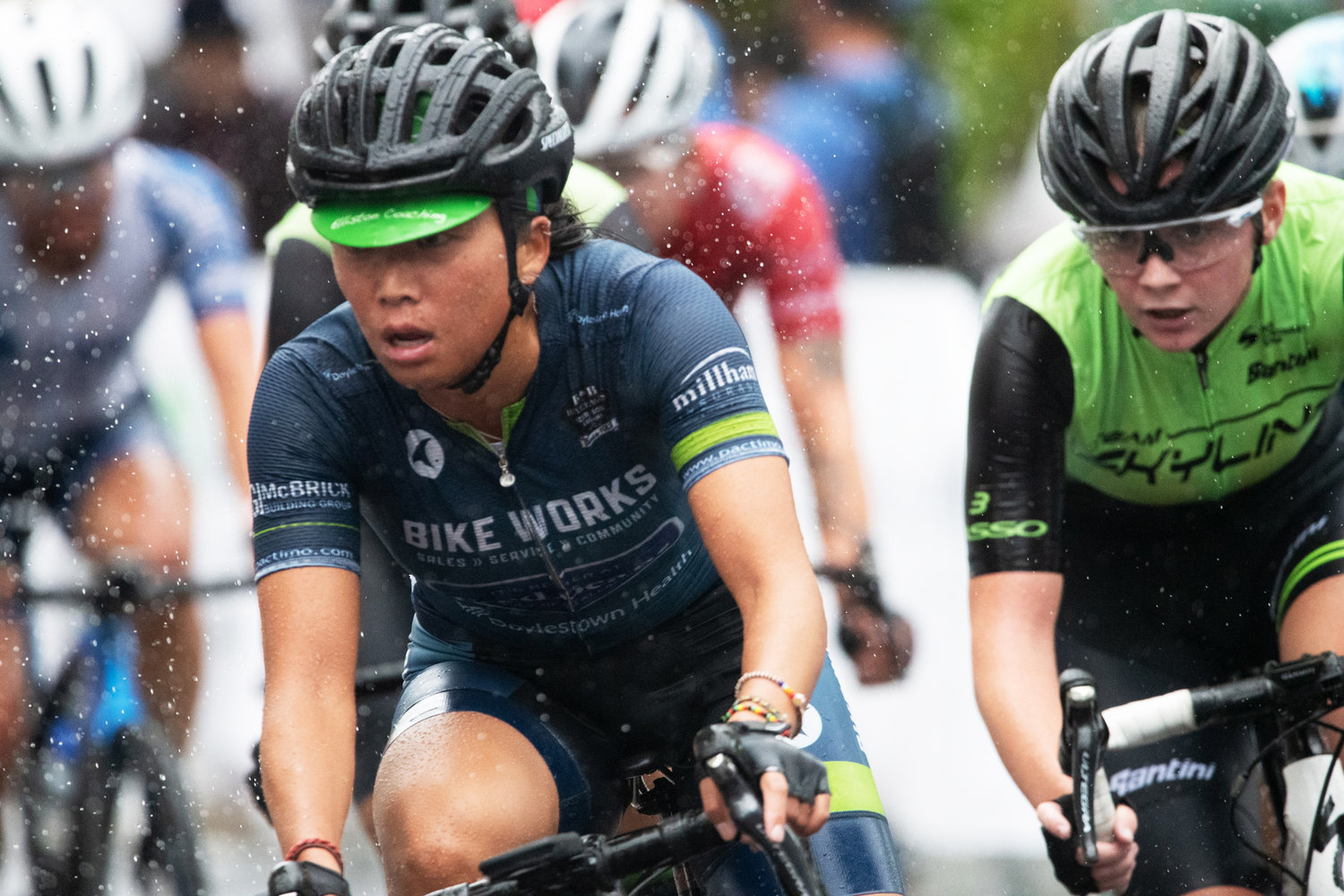 Doylestown Health Women Pro 1/2 cyclists race through Doylestown.