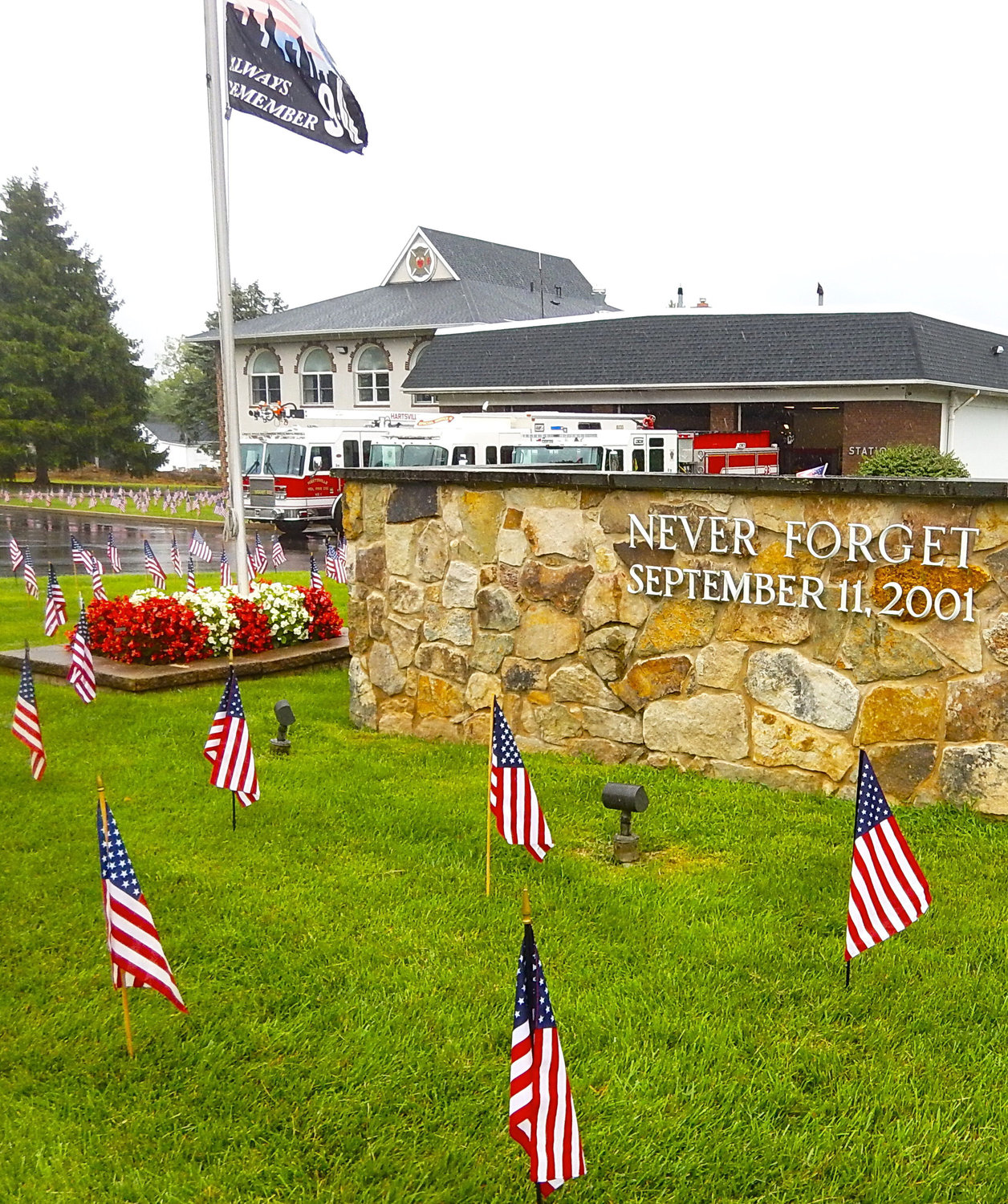 A sign at the Hartsville Fire Company reminds all to never forget 9/11.