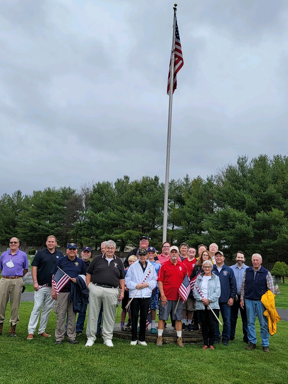 Volunteers from the Knights of Columbus Fourth Degree Assembly and their family members posed for a photograph.