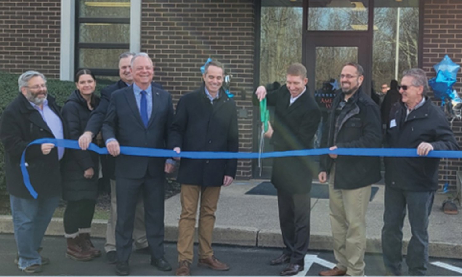 Pennsylvania American Water President Justin Ladner cuts the ceremonial ribbon on $24 million in upgrades at the Lower Makefield Township treatment plant as, from left, Yardley Borough council member David Appelbaum, council President Caroline Thompson, Lower Makefield Supervisor John Lewis, state Rep. Perry Warren, state Sen. Steve Santarsiero, PAW Project Manager Dave Lentowski and Pennsbury School Board member Gary Sanderson look on.