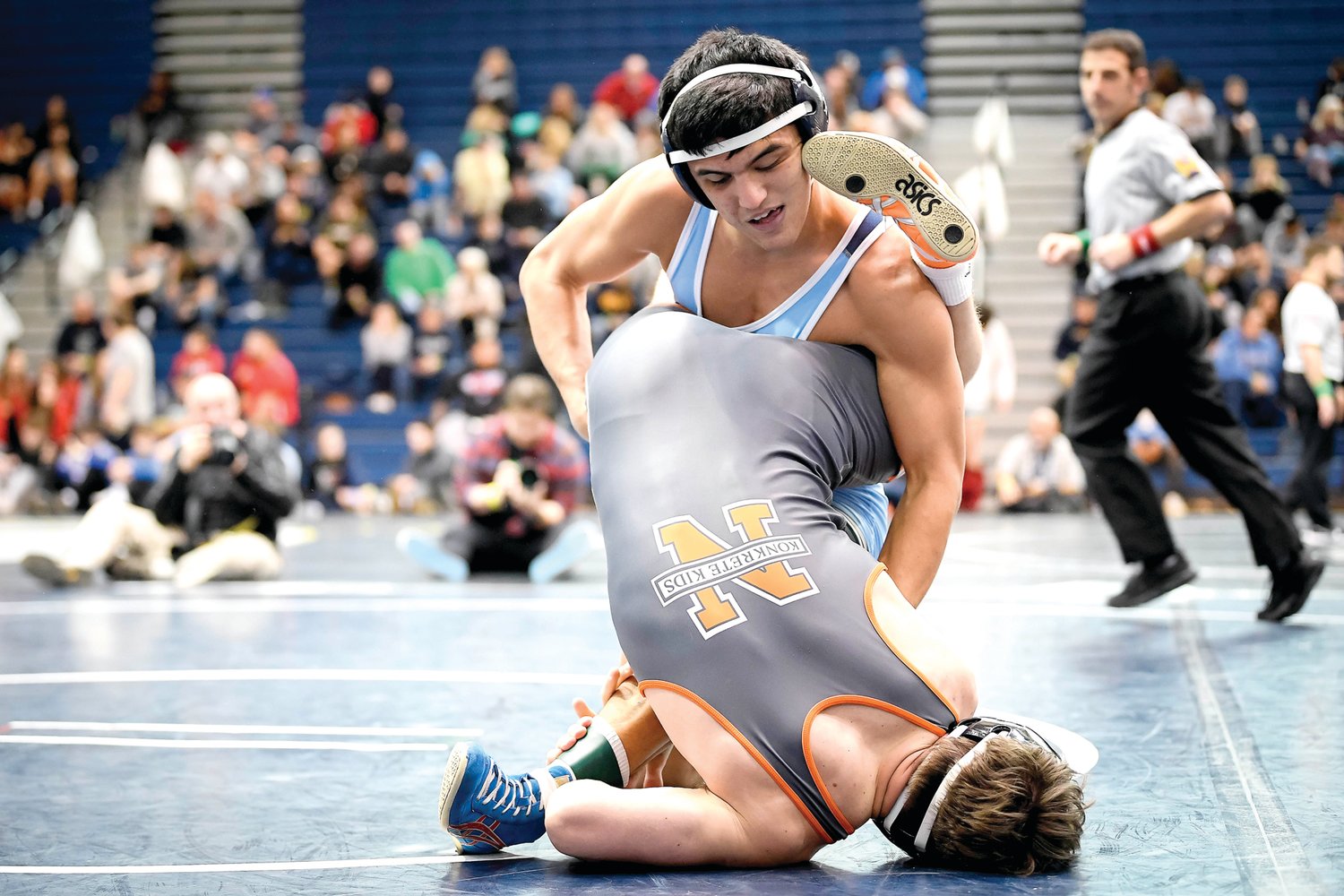 Council Rock South’s Bekhruz Sadriddinov slams down Dagen Condomitti of Northampton during a 160-pound semifinal match won by Sadriddinov in a fall.