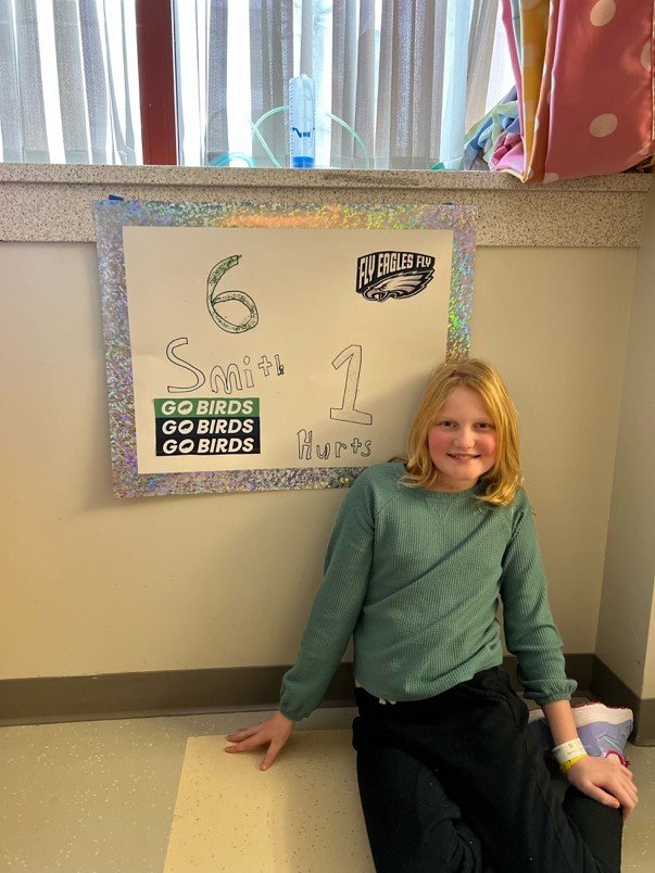 CONTRIBUTED PHOTO
Lily Meade pays tribute to Philadelphia Eagles quarterback Jalen Hurts and wide receiver DeVonta Smith in her hospital room at Children’s Hospital of Philadelphia, where she spent the Eagles’ 2023 NFC Championship run.