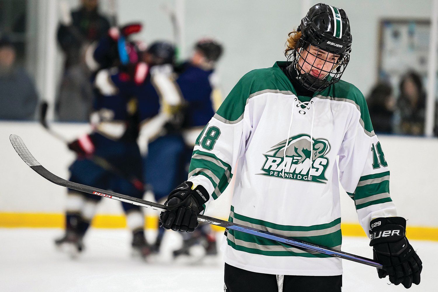 Pennridge’s Andrew Lizak skates off the ice after the final whistle.