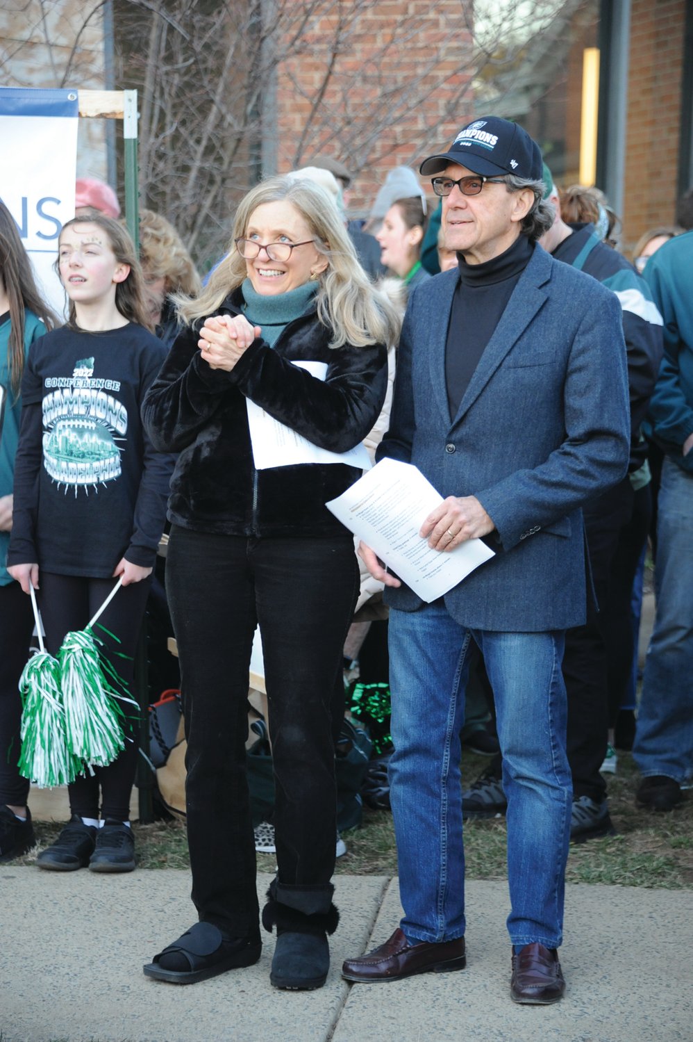 Ann Meredith, executive director of the Herald Foundation, and Joseph G. Wingert, Herald publisher, watch the performances during the Herald’s “Bucks County Loves the Birds” pep rally on the lawn of the old county courthouse in Doylestown Friday.