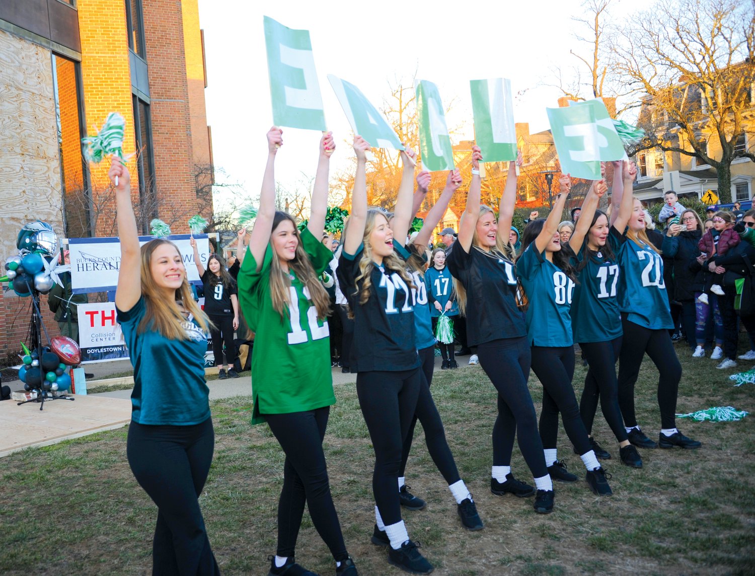 Members of the Fitzpatrick School of Irish Dance lead the crowd in an “E-A-G-L-E-S Eagles!” chant during their Friday night performance at the Herald’s “Bucks County Loves the Birds” pep rally on the lawn of the old county courthouse in Doylestown.