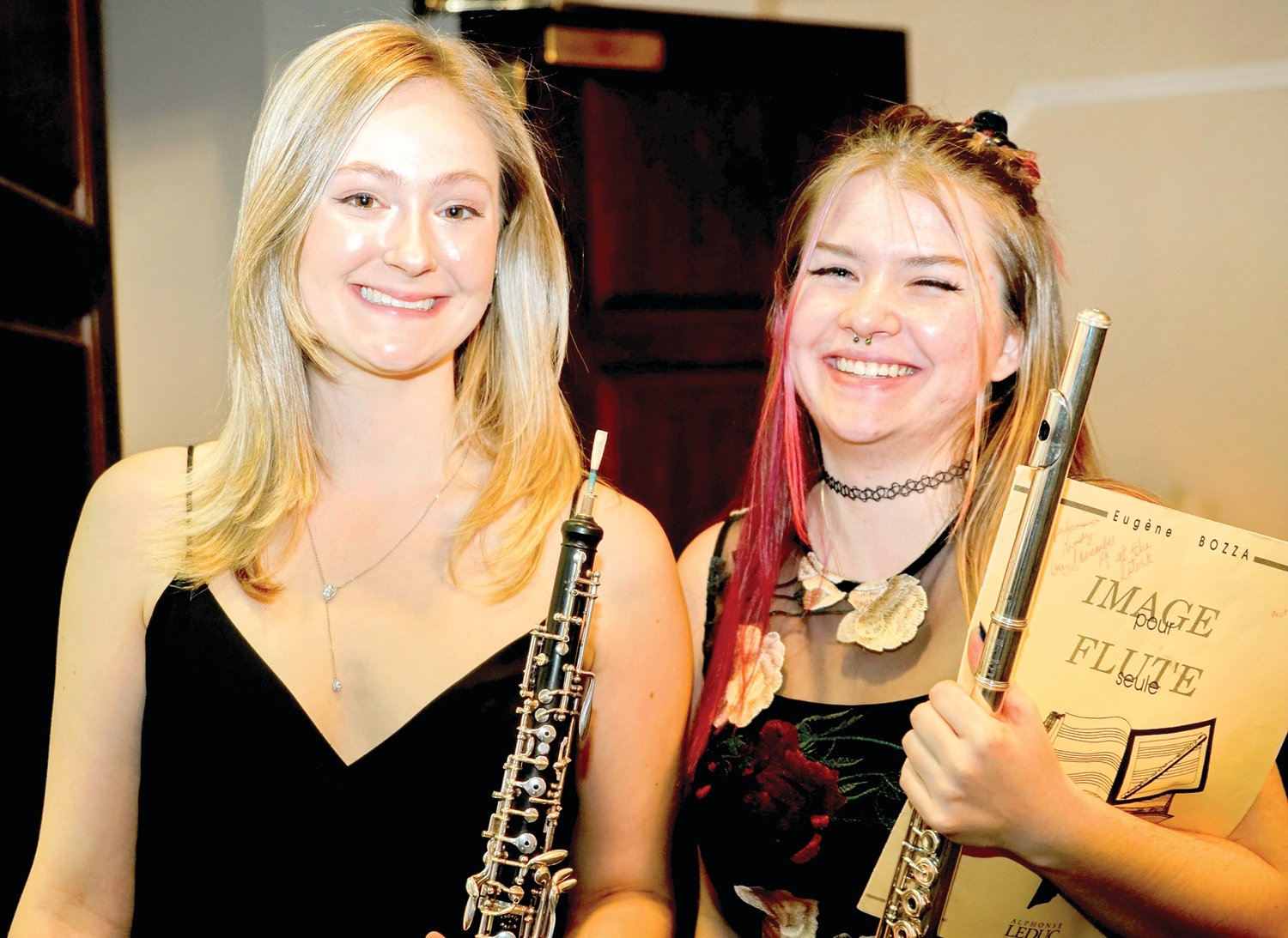 YOBC alumnae Amanda Rearden and Michelle Davis pose for a photograph prior to their performances at the benefit.