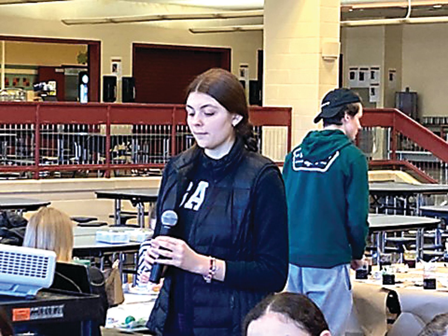 Council Rock South student Anastasia Chystukh, who fled Ukraine with her mother seven months ago because of the Russian invasion, talks during a demonstration of the Ukranian Easter egg decorating technique of Pysanky.