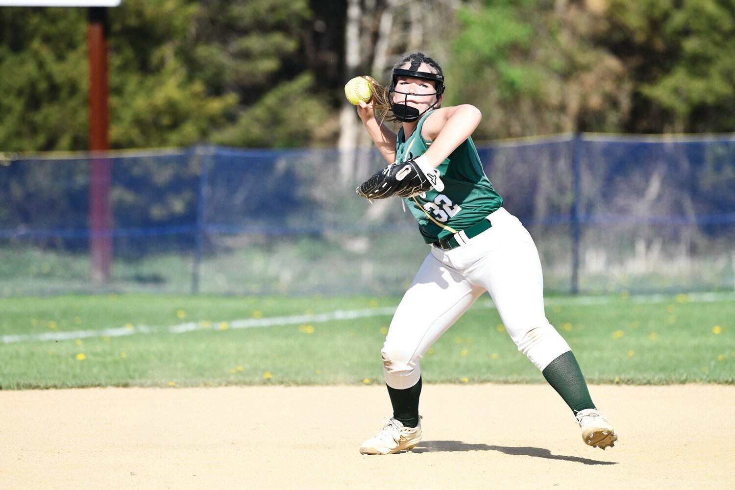 Nativity BVM shortstop Hannah  Zimerofsky takes a ground ball for a throwout at first.