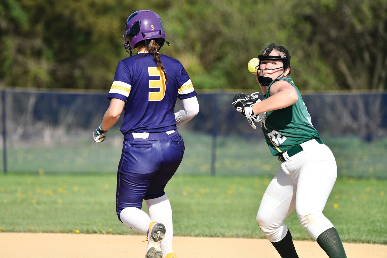 Palisades’ Ashley Amato goes into second standing up.