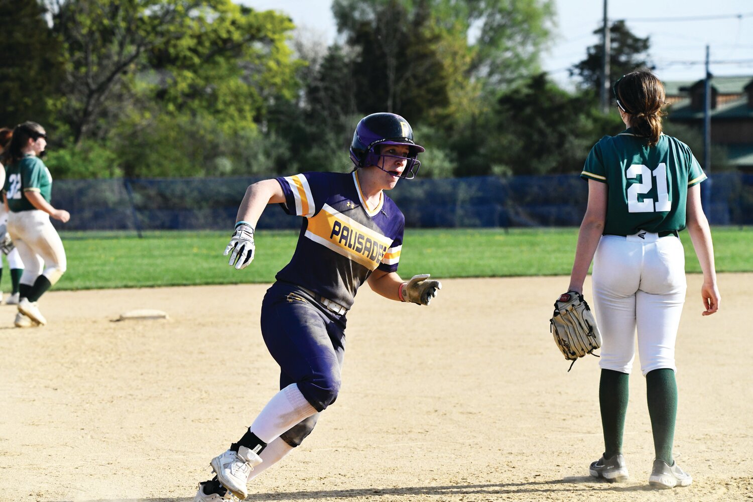 Palisades’ Bri Hunter rounds third base.