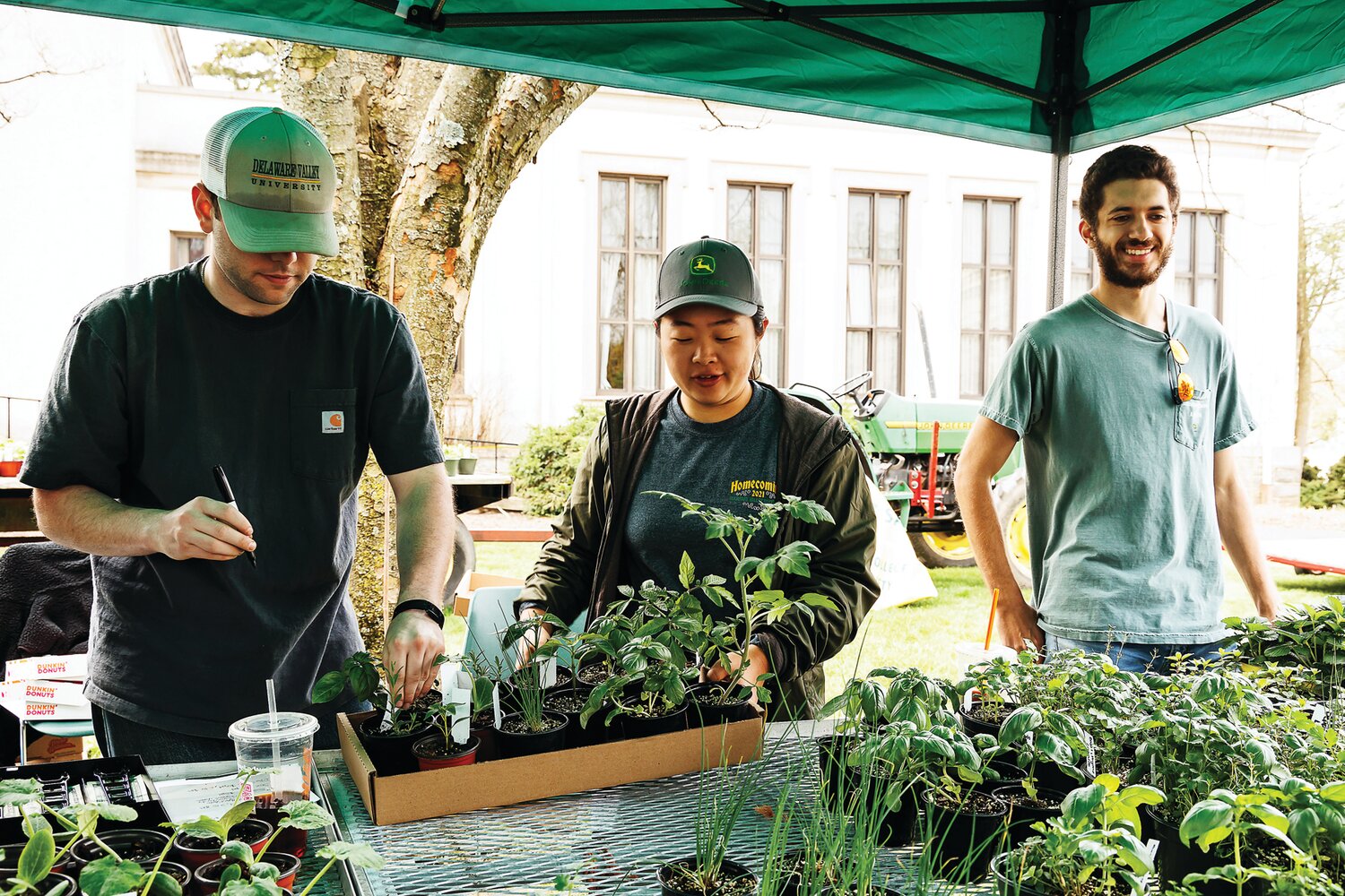 Students sell plants at a previous A-Day at Delaware Valley University.