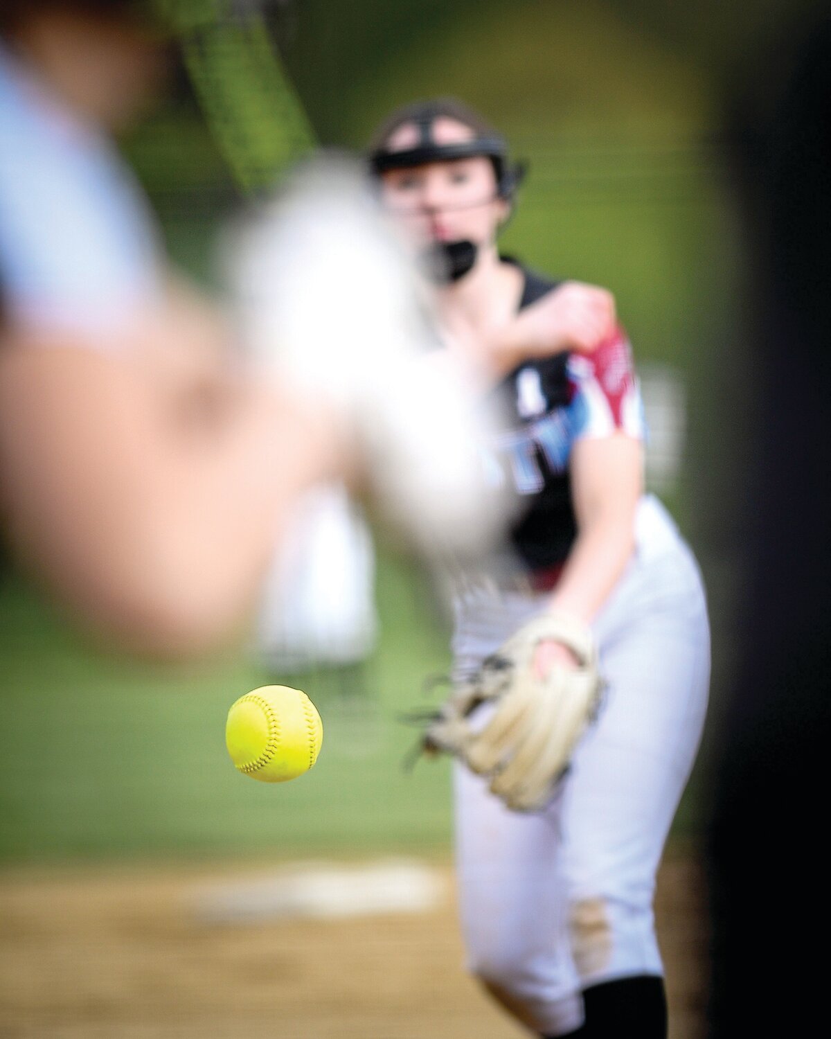 Faith Christian pitcher Olivia Michalski hurls the ball during the third inning.