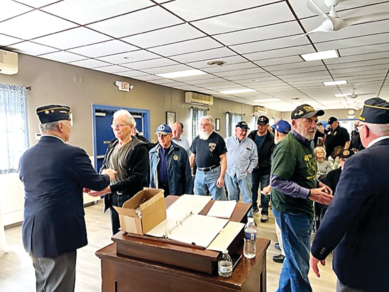 Vietnam Veterans are presented with their pins.