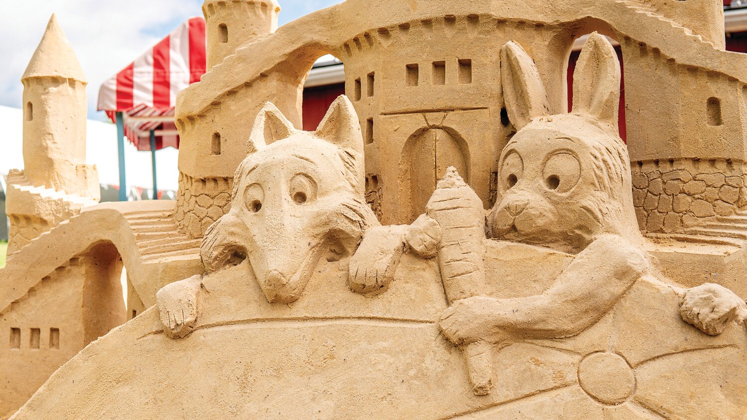 Starting May 15 (weather permitting), Peddler’s Village visitors can watch sand sculpting teams create exceptionally tall works for the “Stories in Sand” summer-long event, opening June 1.