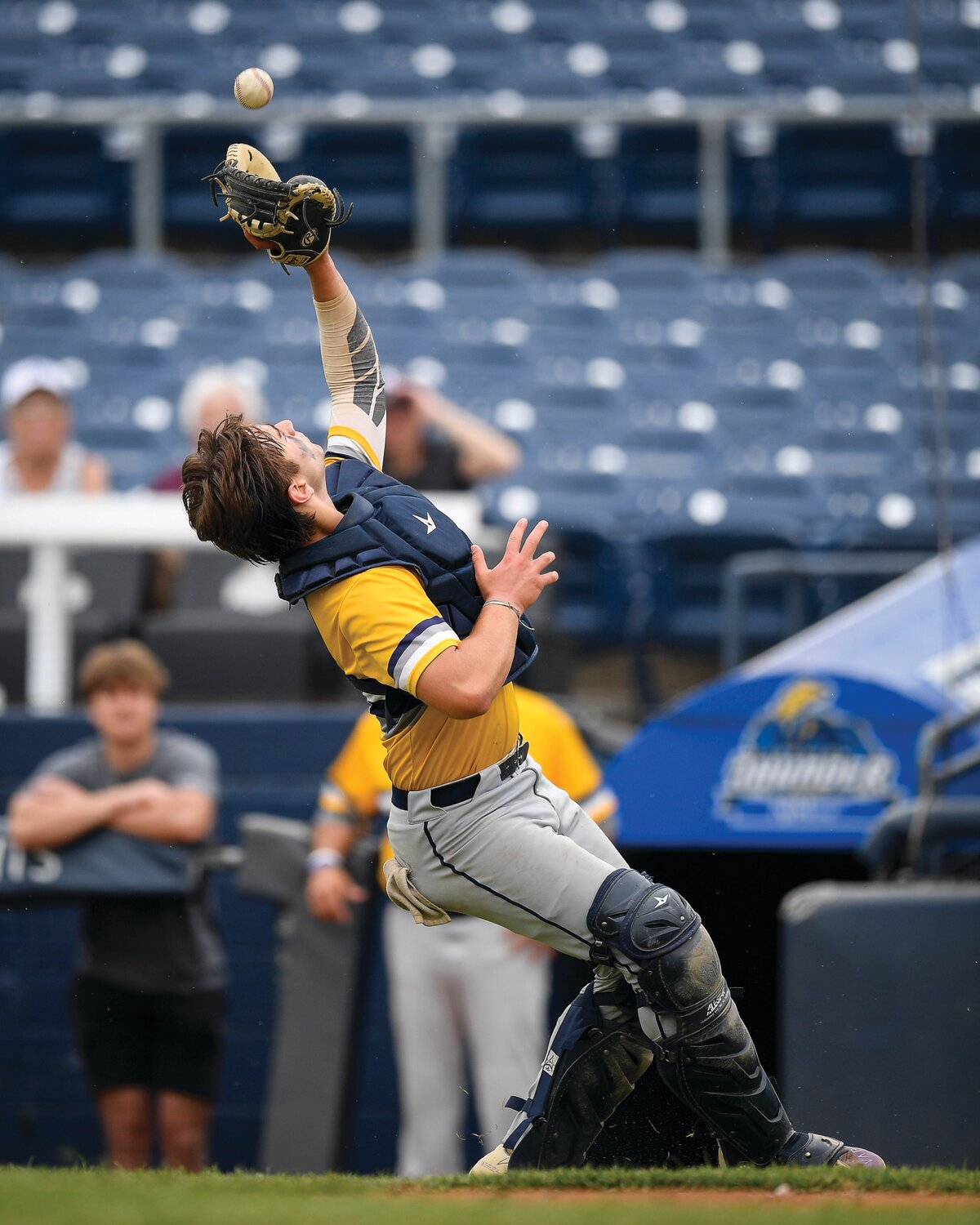 New Hope-Solebury’s Brooks Saft circles under a tough pop up at home plate.