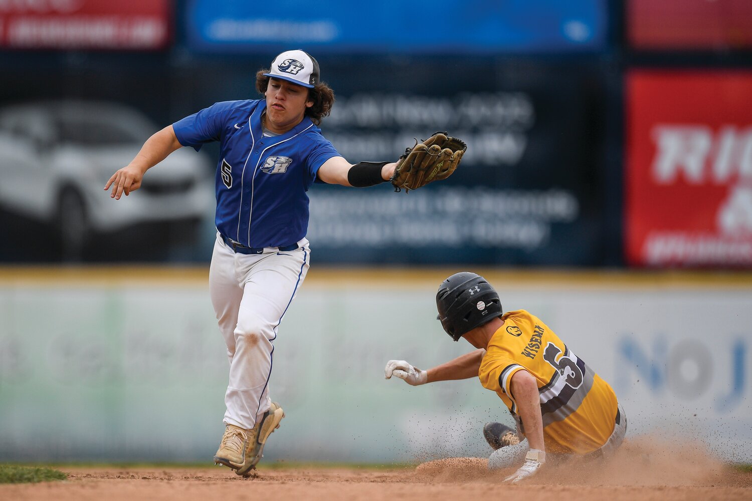 South Hunterdon second baseman Cooper Currie lunges for the throw as New Hope-Solebury’s Nate Wiseman steals one of his three stolen bases.