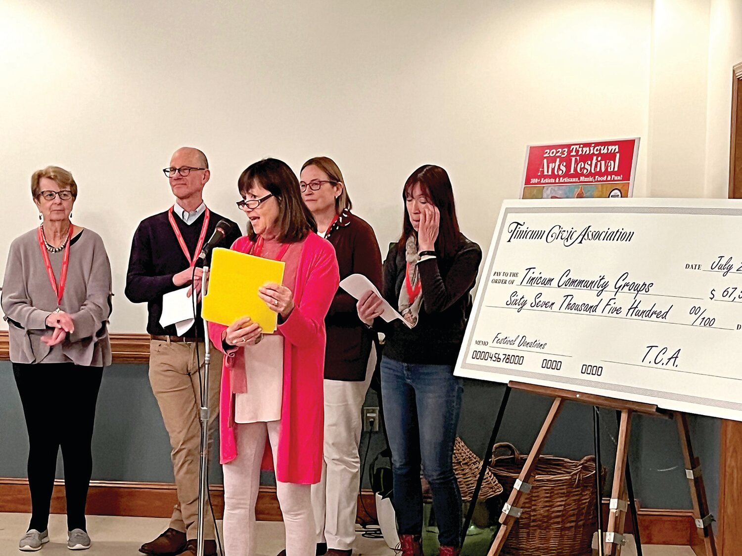 Tinicum Civic Association President Sue Walsh and board members with a ceremonial check.