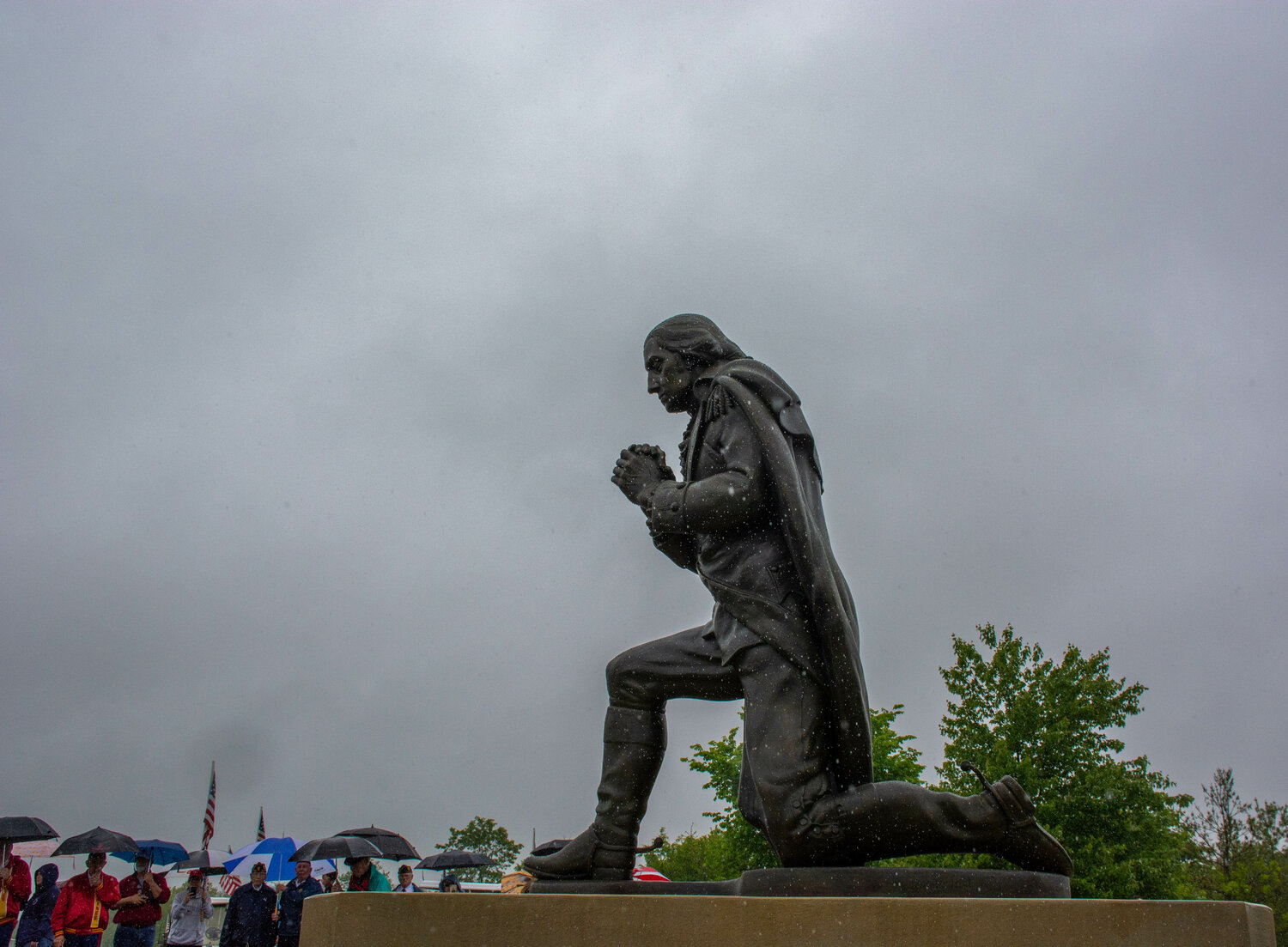 Doylestown sculptor Jennifer Frudakis-Petry described her statue of George Washington kneeling in prayer as an effort “to capture a moment of peace in the hope that it will bring peace to those who pass by” it at Washington Crossing National Cemetery in Upper Makefield.