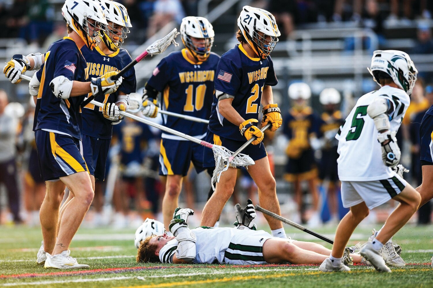 Pennridge’s Drew Ferguson gets flattened and loses his helmet on a shot attempt in the first period. Ferguson would stay in the game and score the next goal.