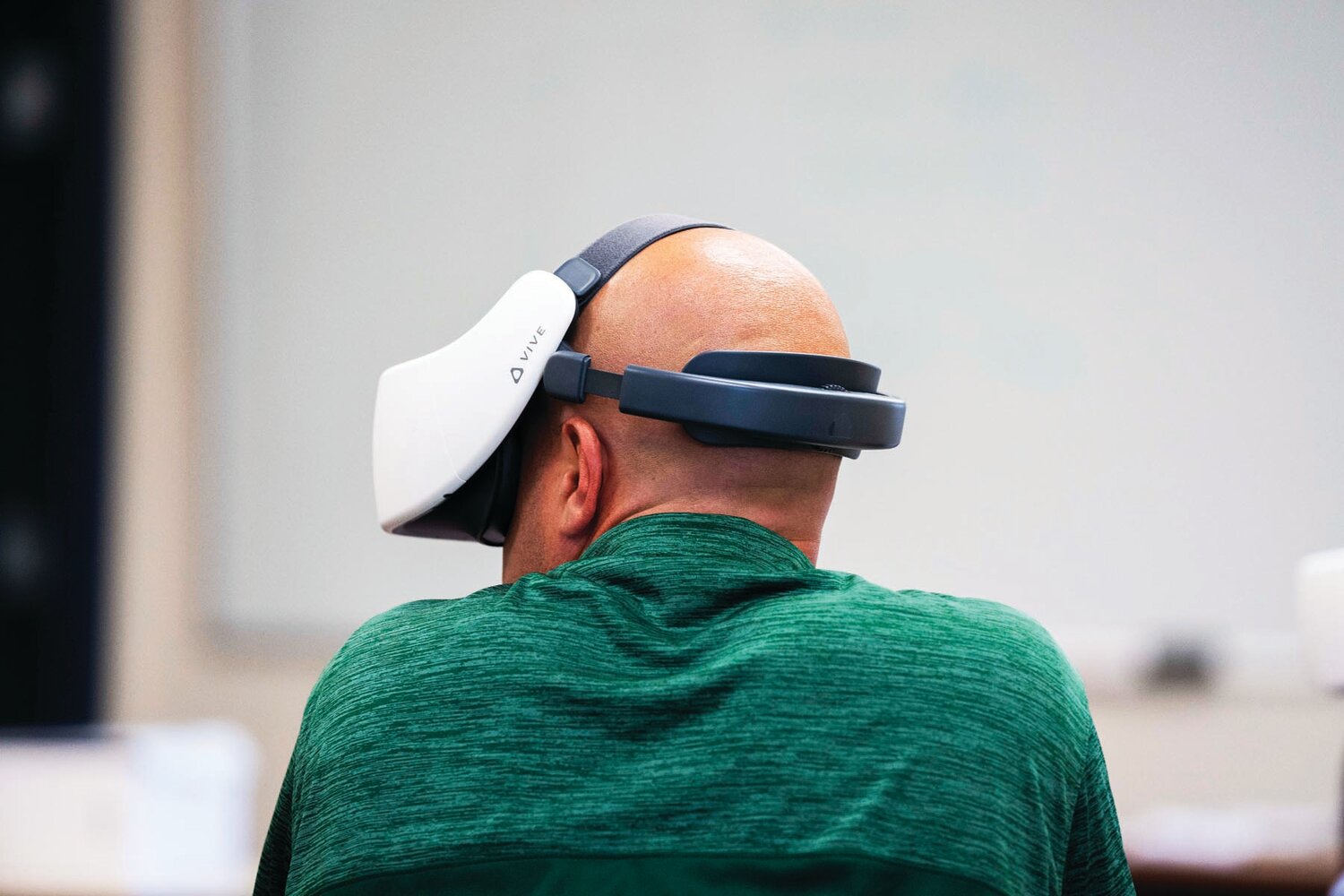 Northampton Police Detective Richard Gensler uses a VR headset to run through many different crisis scenarios during Crisis Intervention Team training Thursday afternoon. He was studying different deescalation tactics, aimed at safely resolving a situation.