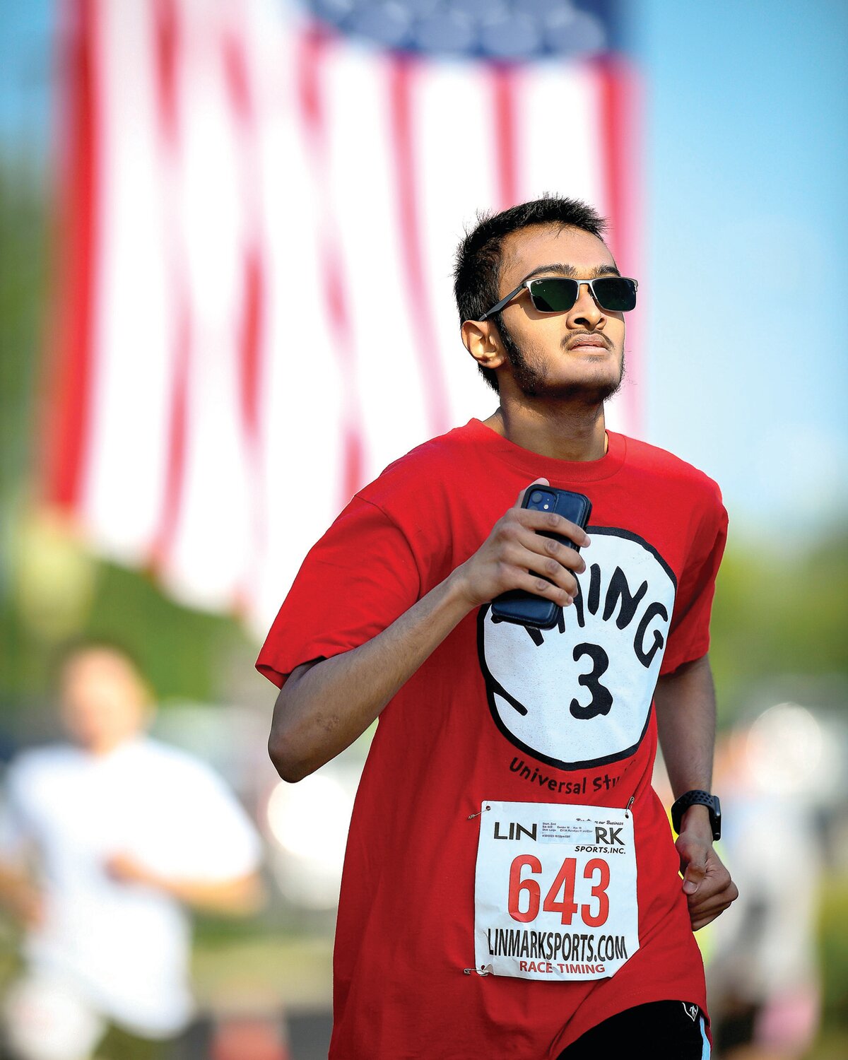 Zaid Shaik of Bensalem nears the finish line with a time of 22:29.