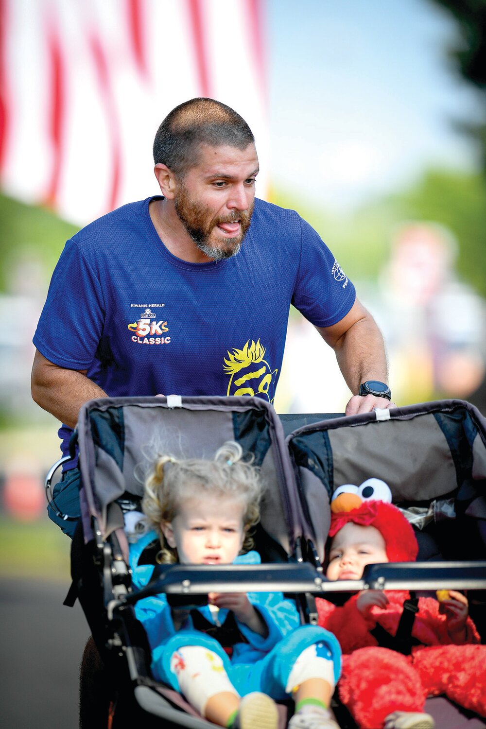 Family in tow, John Boehm of Morrisville ran the race with his two kids and finished in a time of 22:51.