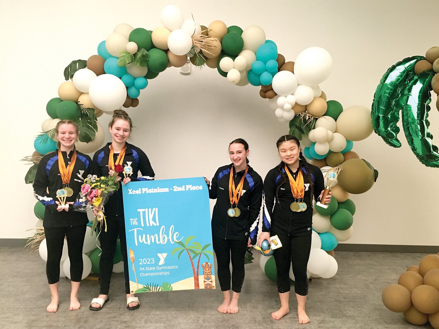 The Xcel Platinum second-place team: From left: Olivia Horner, Cassia Williams, Victoria Angelino and Rhea Liddington.