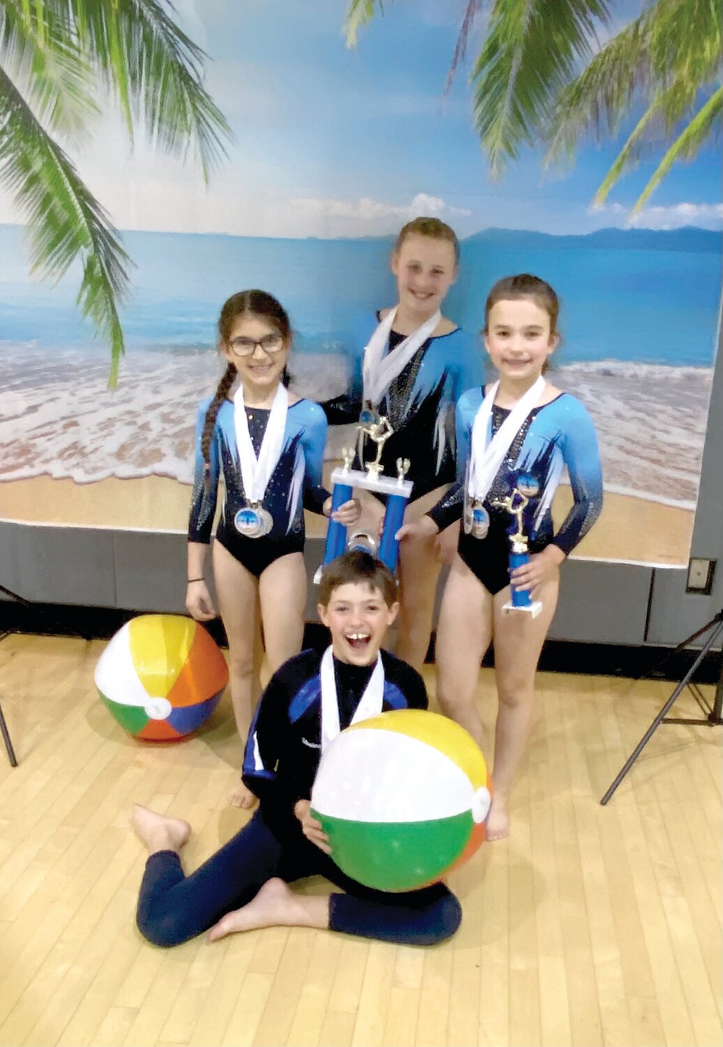 The states Level 3 third-place team: From left, clockwise: Gabrielle Holmes, Ava Ortiz, Gracie Lynch and Shaina Freed.  Missing from photo: Ella Smith, Brienna Ruvolo, Lily Brose, Cecily Clifford, Kayla Dinh-Pham, Alaina Jacavage, Genevieve Heimark, Shadelynn Sandler and Bailey Lonergan.