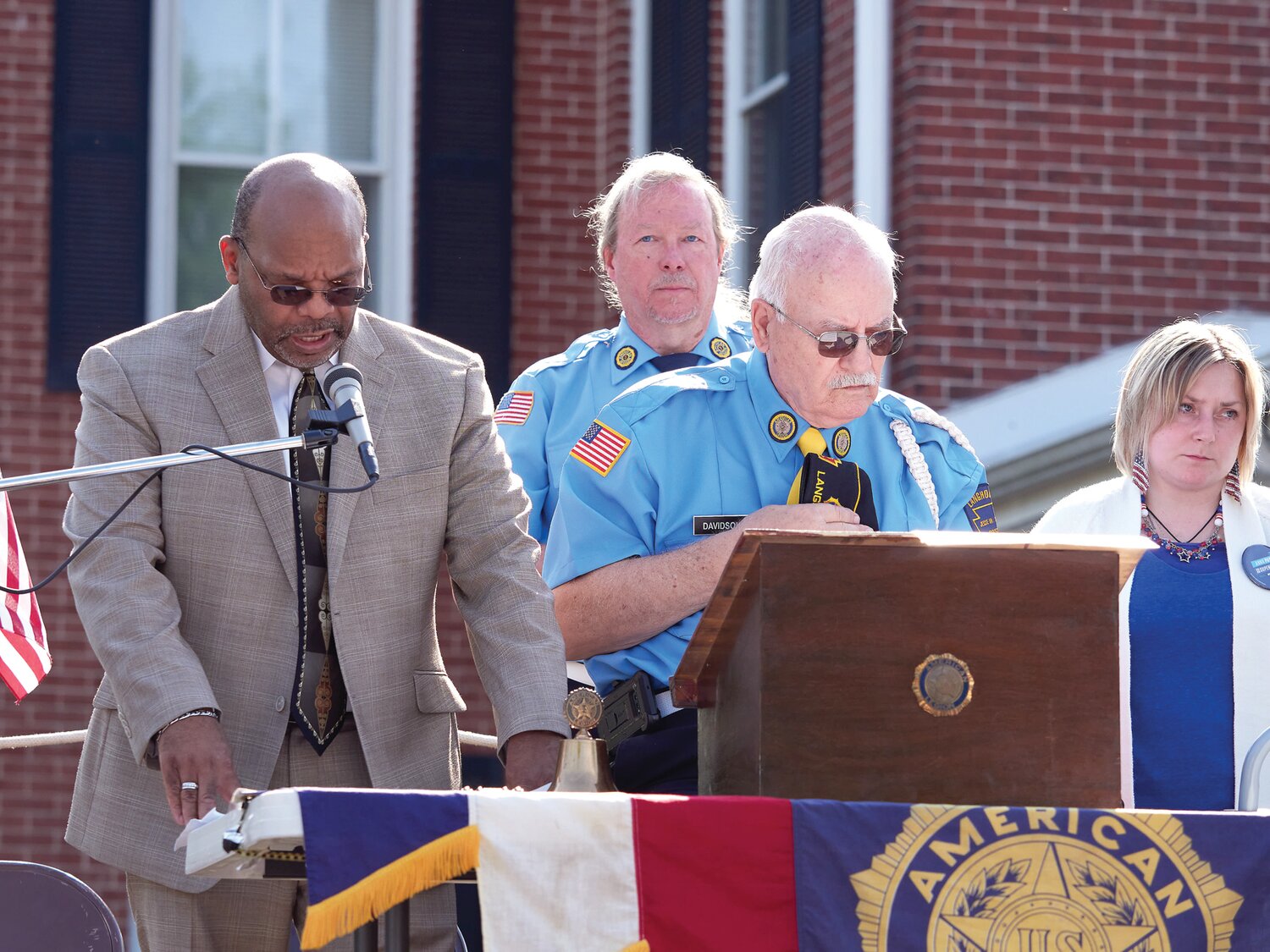 The Rev. Luke Mason, during the invocation at the ceremony.