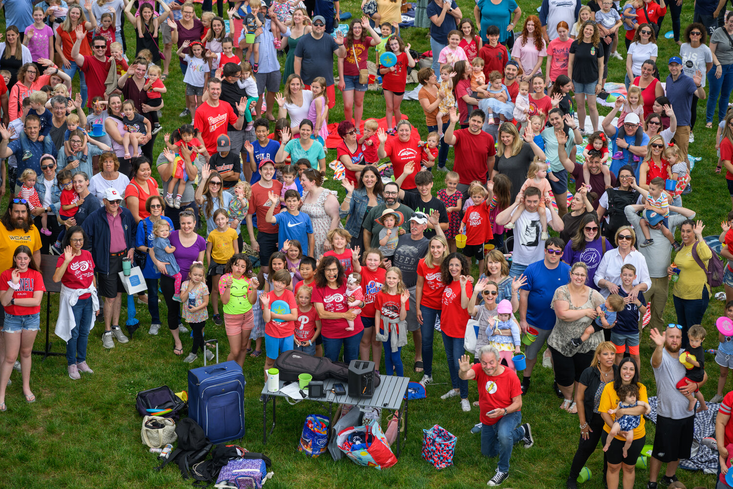 The crowd paused during  “Miss Marilyn” Schwartz’s final class in Lower Makefield after 25 years to take a group photo from the top of a firetruck’s ladder.