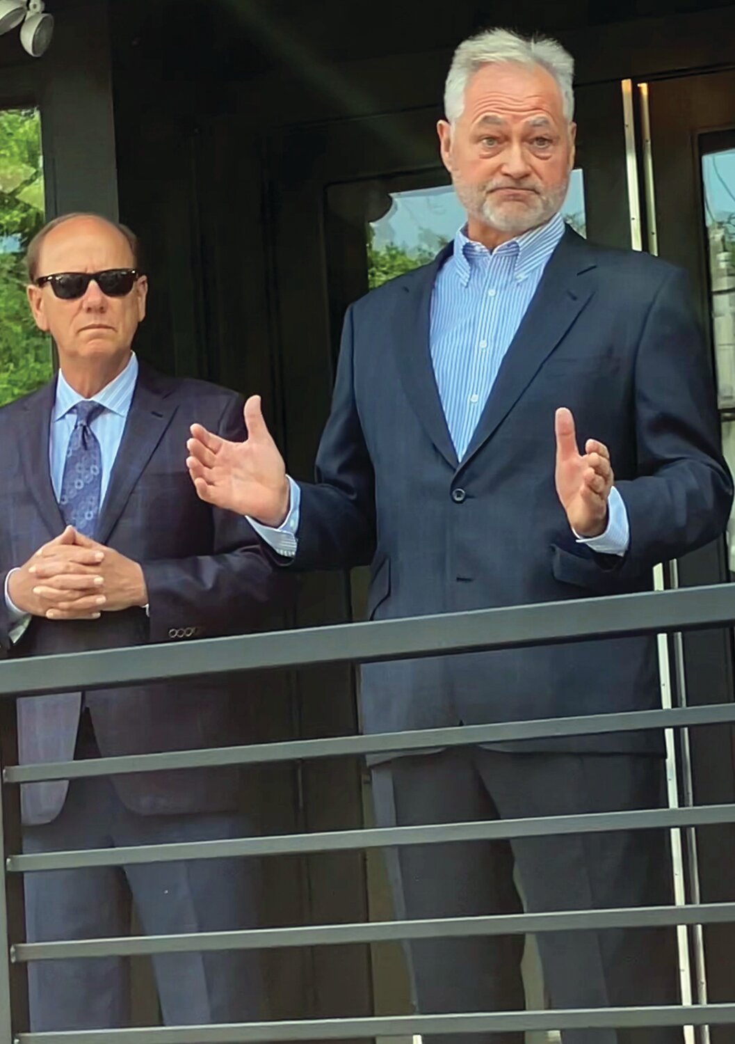 Stephen H. Can, right, talks about the challenge grant he issued to jump-start the Elevate the Arts capital campaign last year at Tuesday’s ribbon cutting of the renovated New Hope Arts Center. Borough Mayor Laurence Keller looks on.