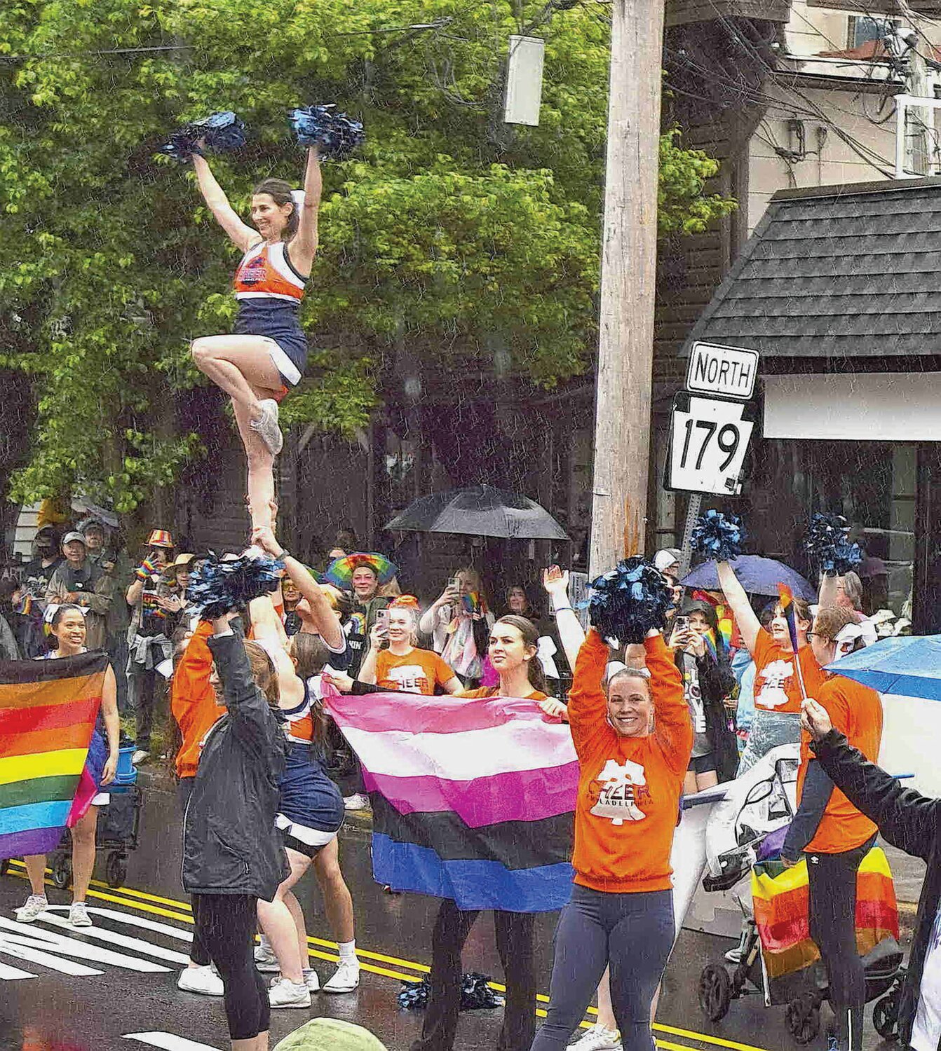 Cheerin’ in the rain.