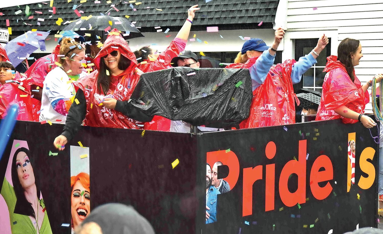 Confetti dots the sky during the PrideFest Parade.