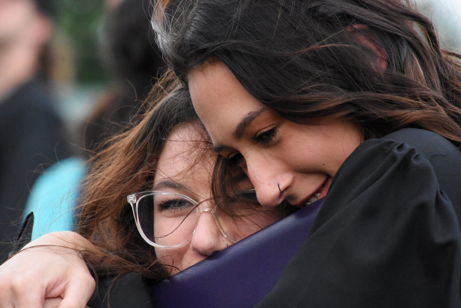 Graduates embrace following Palisades High School’s June 2 commencement ceremony.