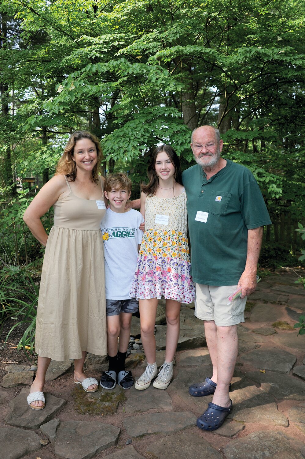 Sarah Cornwell, Finn Cornwell, Amelia Cornwell and Don Borden, owner of the Borden residence, one of the homes on the tour.