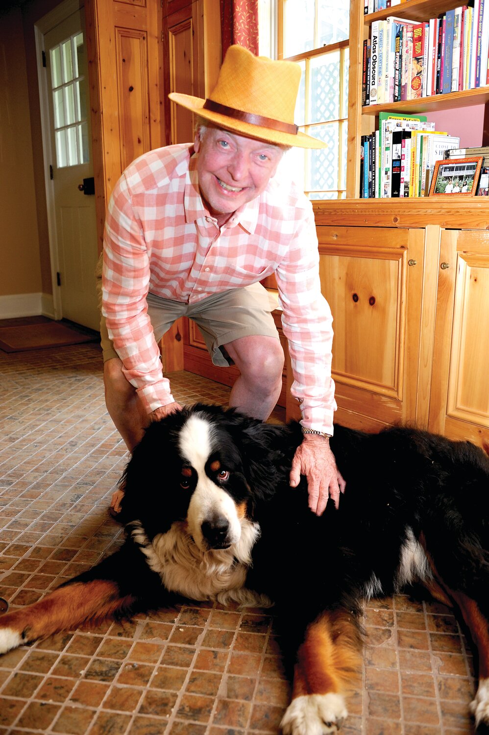 Carter Van Dyke, homeowner, and dog Dr. John B. Watson.