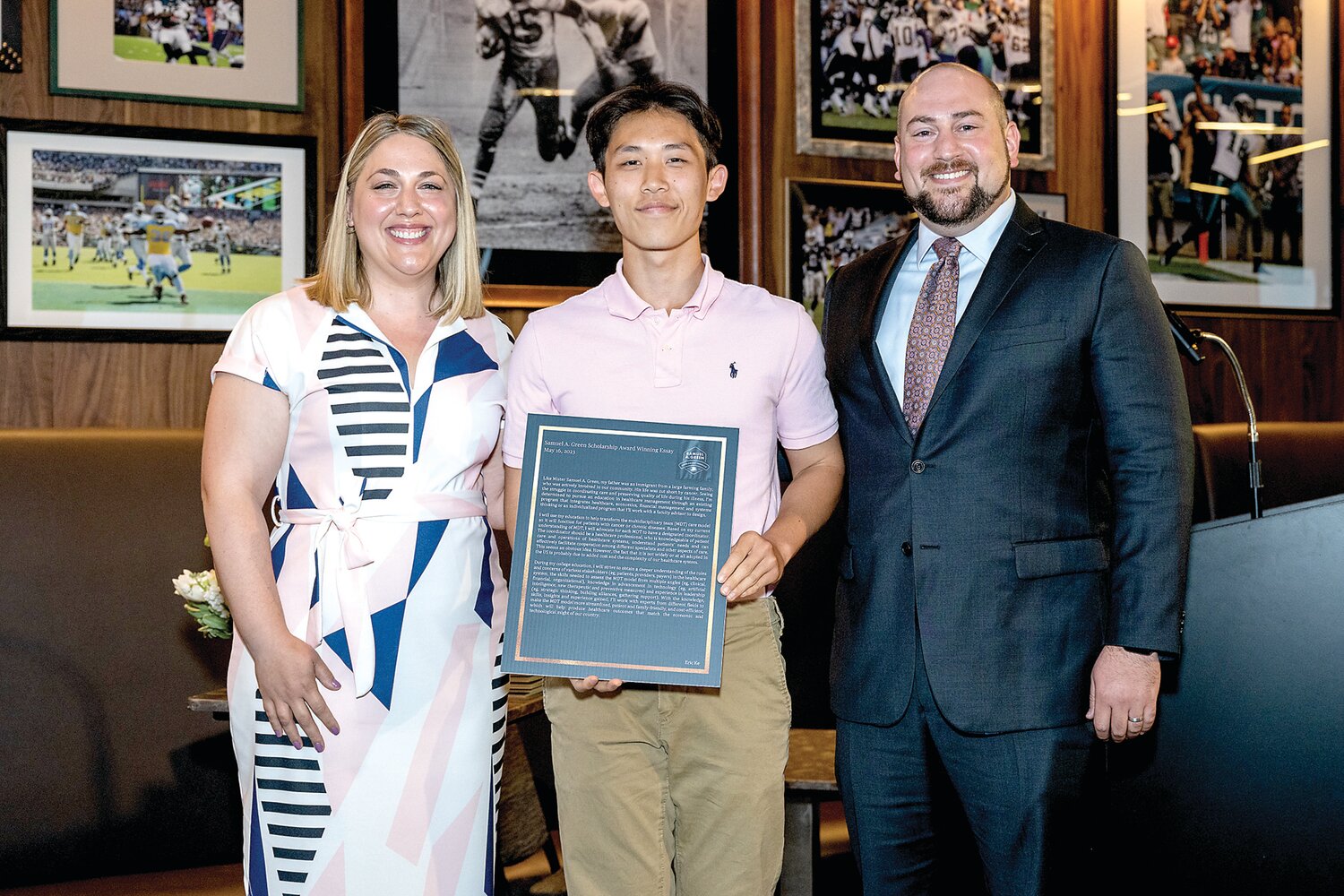 Green family members Sam Green and Alison Green Imbergamo with scholarship recipient Eric Ke.