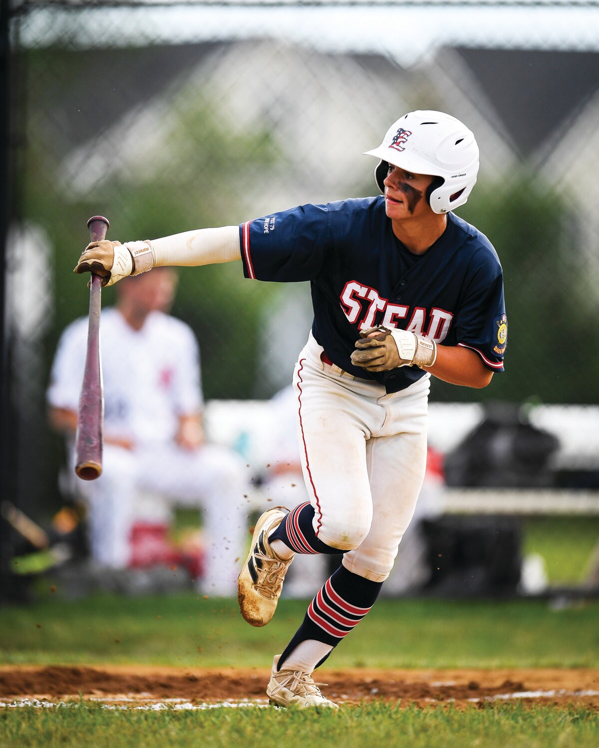 Plumstead’s Zach Oram tosses the bat after a first-inning walk.