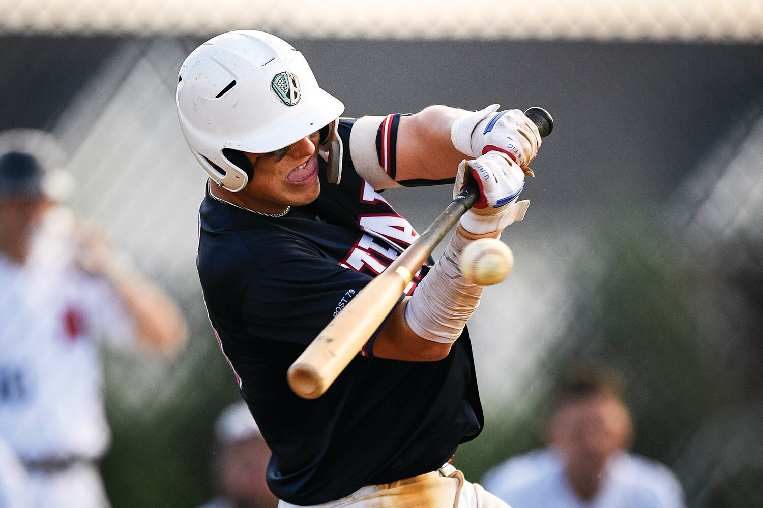 Plumstead catcher Wyatt Harrar makes contact in the bottom of the sixth inning.