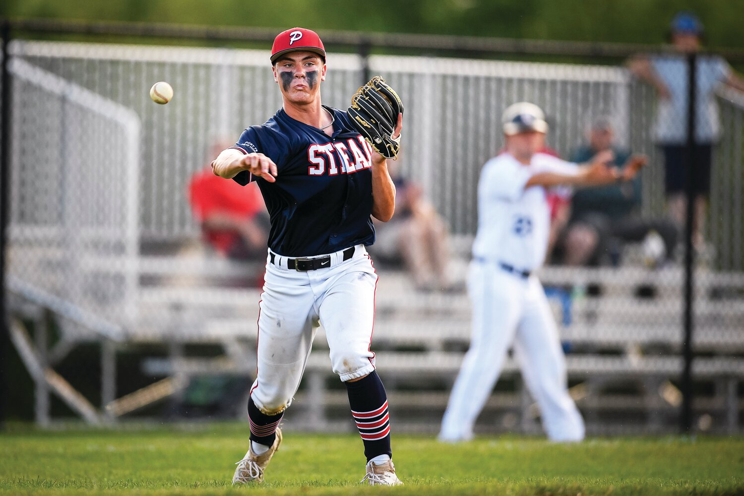 Plumstead pitcher Tyler Bonelli fields a bunt during the top of the fifth inning.