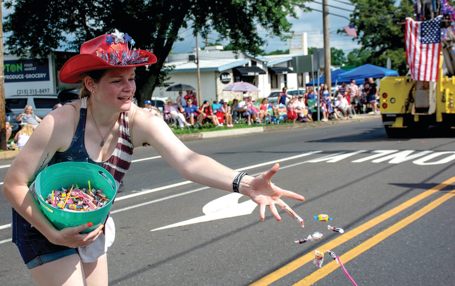 Candy is tossed to the crowd during the Southampton Days Parade.