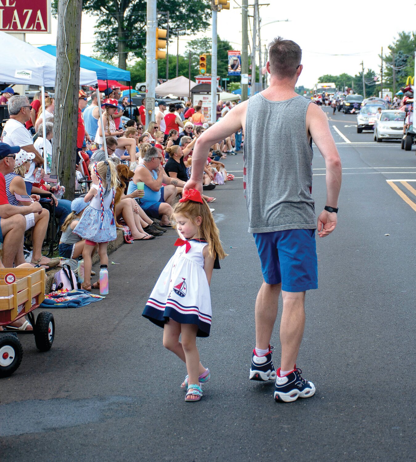 Jack Kennan and daughter Quinn have a good time along the parade route.