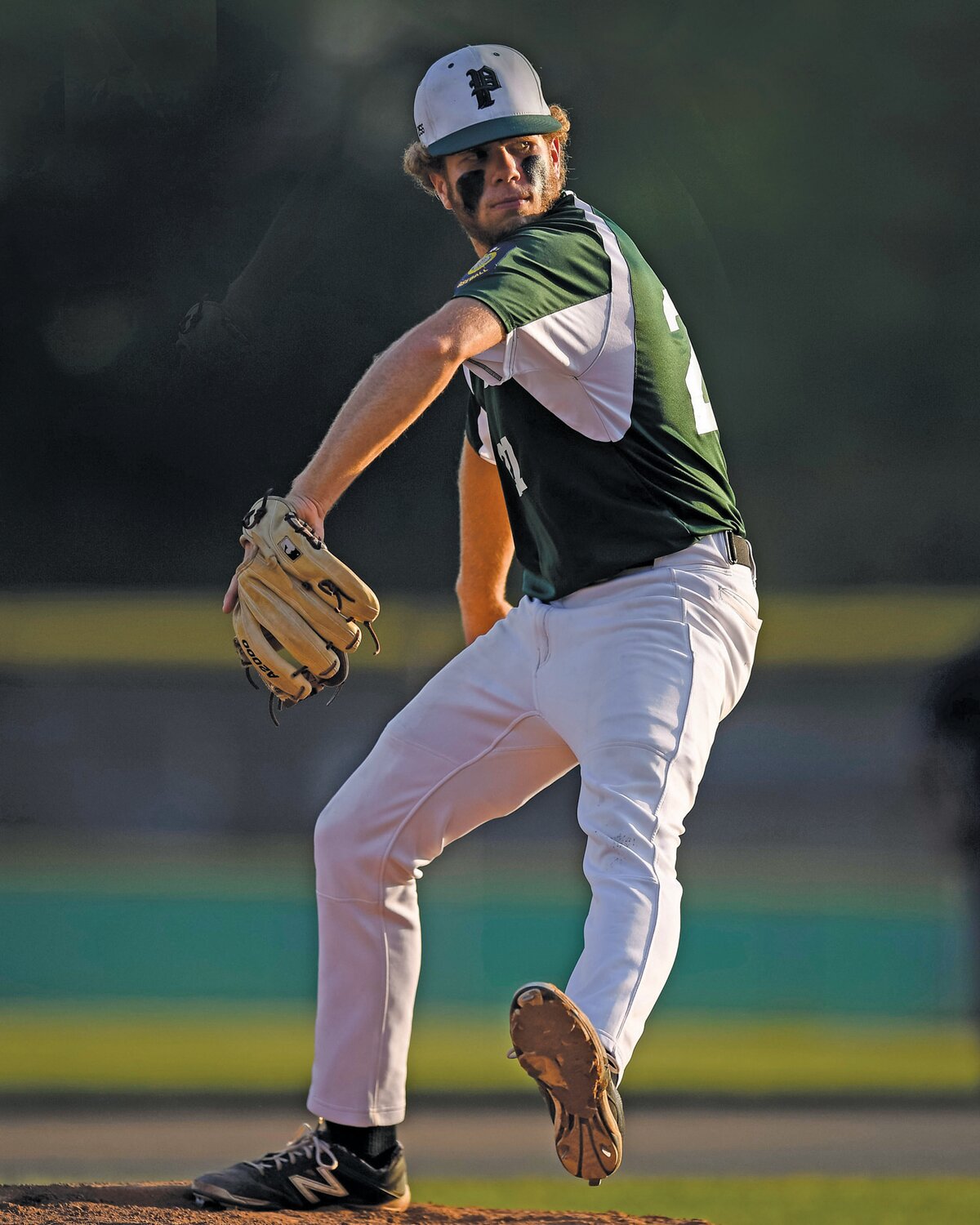 Winning pitcher Nate Lapp delivers a pitch in the first inning. Lapp pitched six innings giving up only two runs in the 7-3 win.