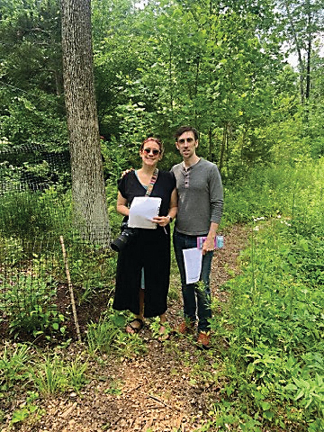 Kristina and Tim Damico enjoy the Delone-Kennedy garden.