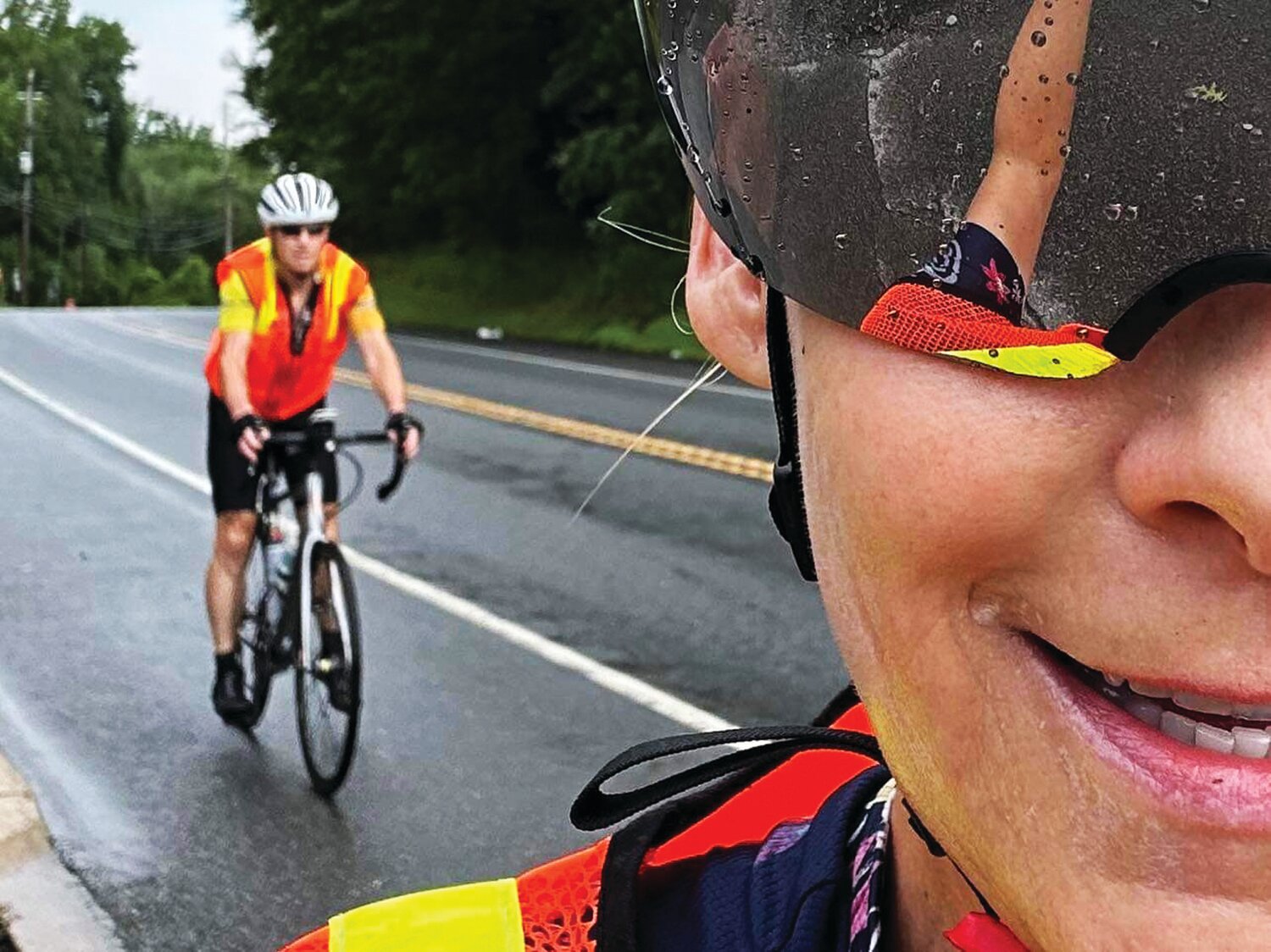 Bryn Fleming takes a selfie with Joe Boyce approaching on the rainy Friday as the pair leave Matamoras.