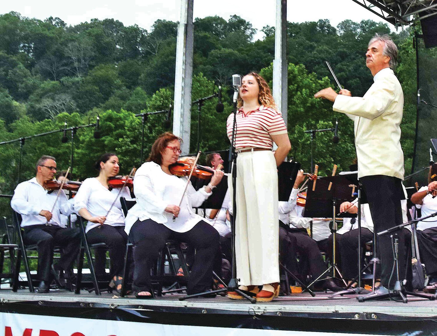 The national anthem is performed at the beginning of the concert.